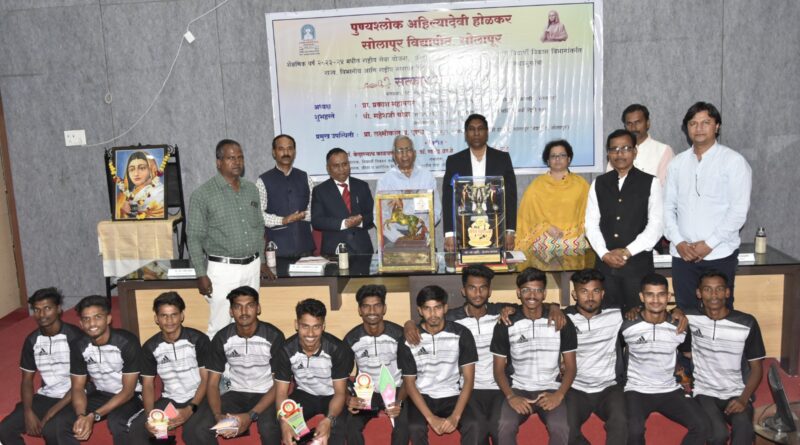 Honoring the successful students in Arts, Sports, NSS in Solapur University