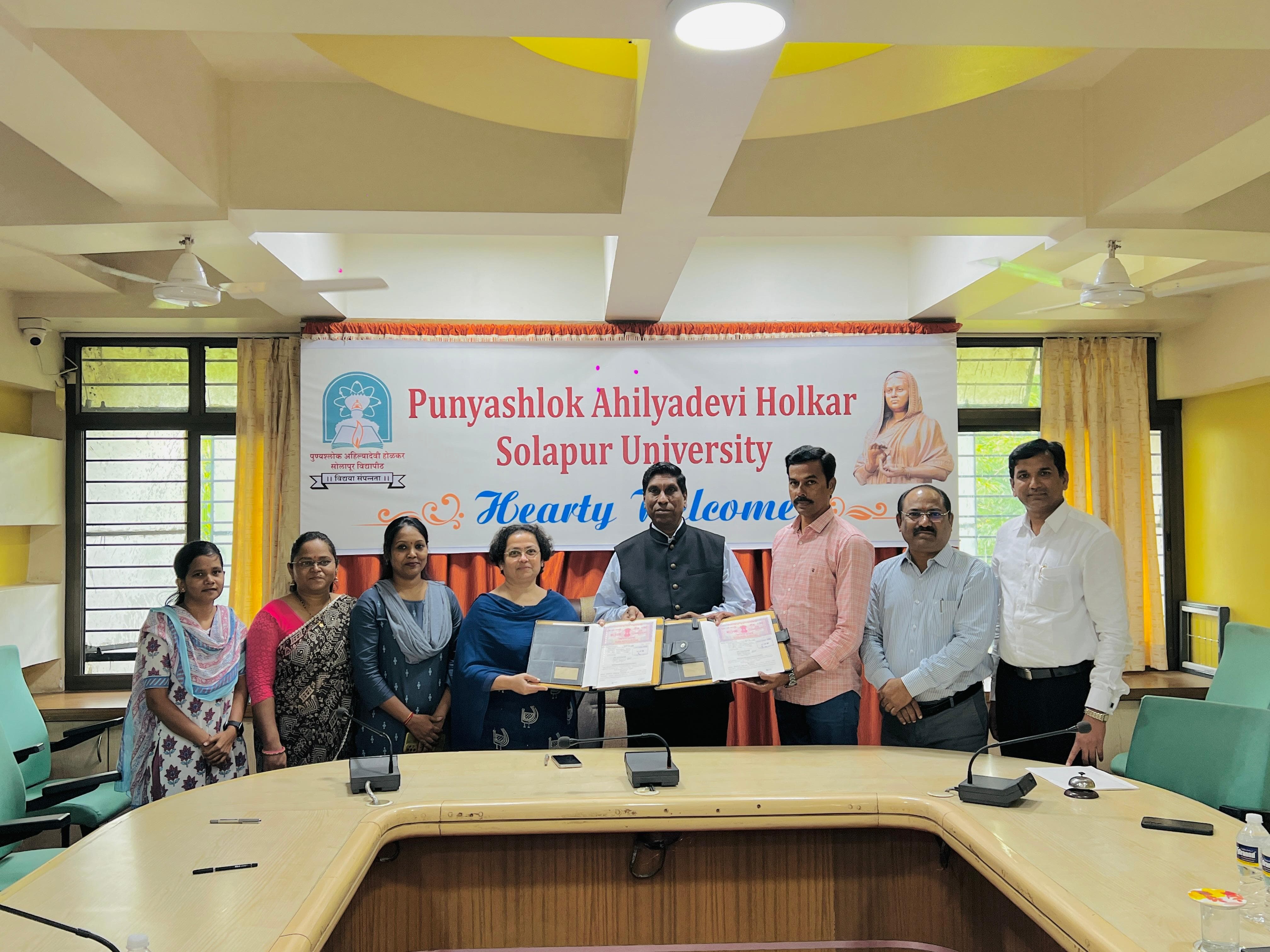 MoU of Solapur University with two institutes for research and training in Biological Sciences