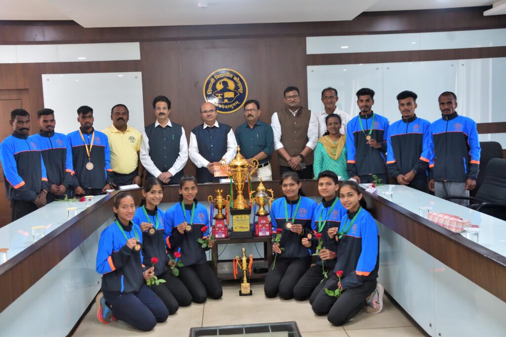 Shivaji University Kolhapur University Vice Chancellor Dr. D. T. Shirke felicitates the players who won national cross country medals