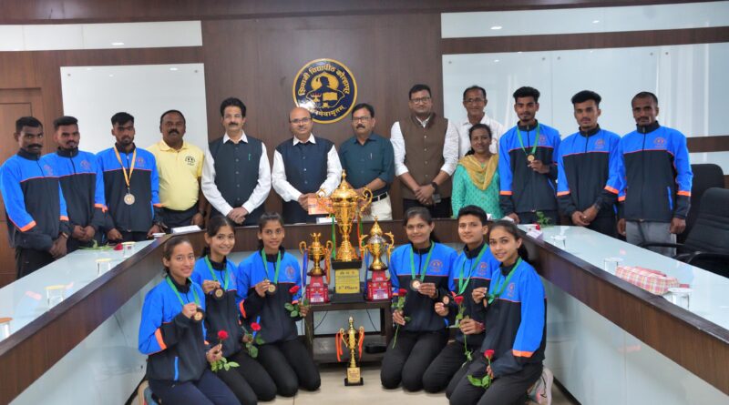 Shivaji University Kolhapur University Vice Chancellor Dr. D. T. Shirke felicitates the players who won national cross country medals