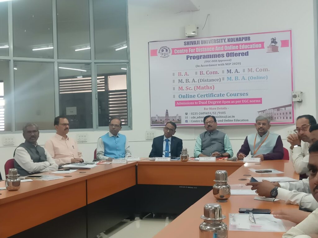 Dr. Madhukar Vavare, Joint Secretary of the UGC Distance Education Department, provided guidance on self-study material development at Shivaji University.