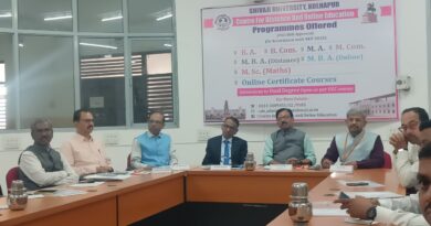 Dr. Madhukar Vavare, Joint Secretary of the UGC Distance Education Department, provided guidance on self-study material development at Shivaji University.
