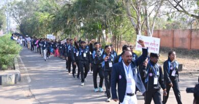 Voter awareness rally at Solapur University campus.